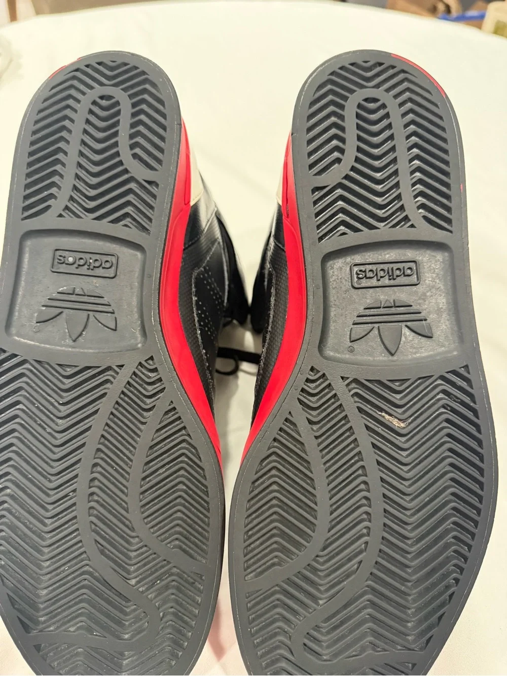 adidas Black and Red High-Top Sneakers